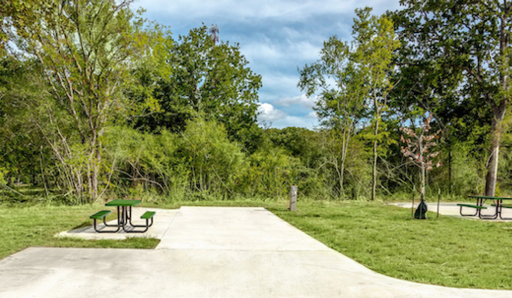 Full Hookup back-in RV sites at The Woods RV and Cabin Resort, offering plenty of amenities for a comfortable and convenient stay surrounded by nature
